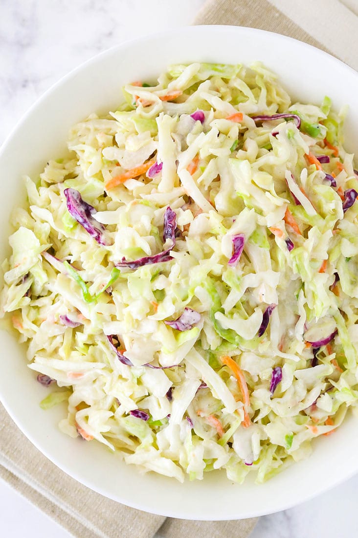 A white bowl of easy coleslaw