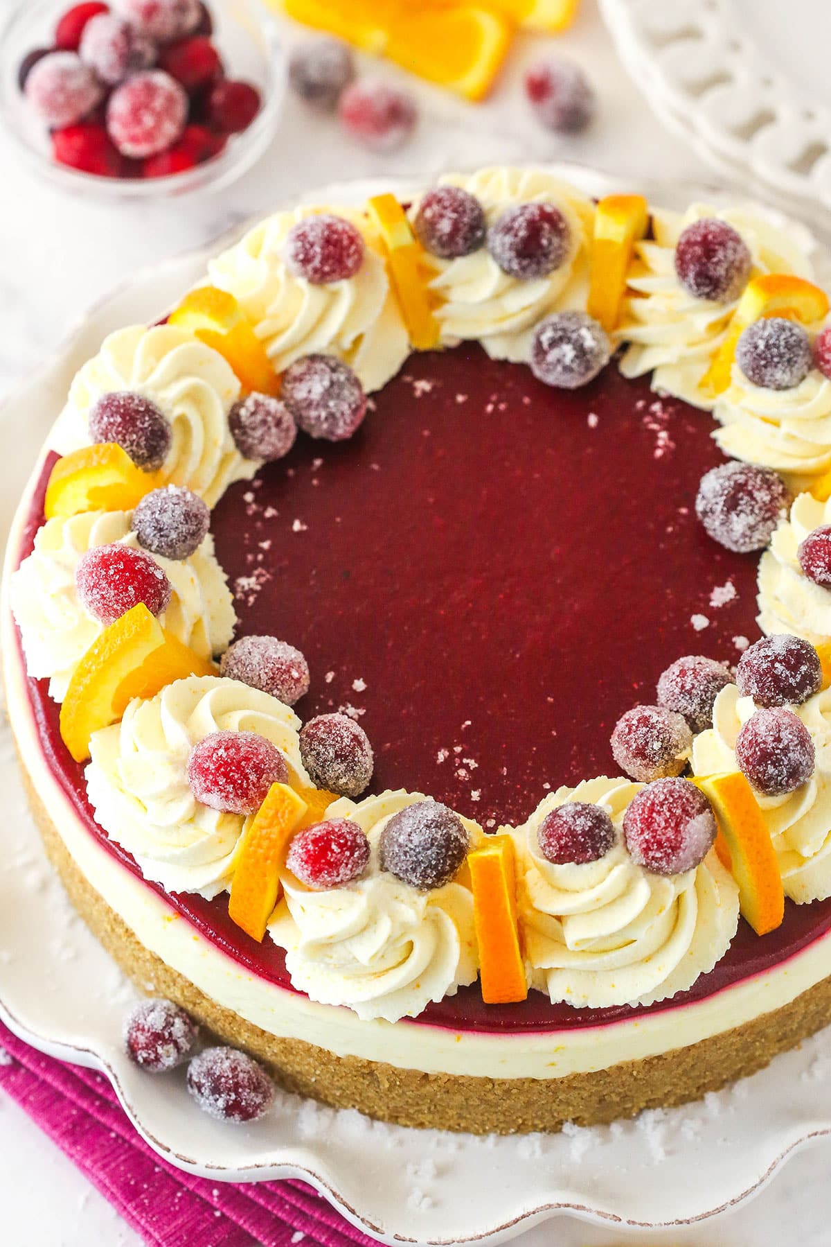 Overhead view of a cranberry orange cheesecake

