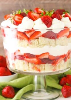 Side view of a full Strawberry Shortcake Trifle in a glass trifle dish